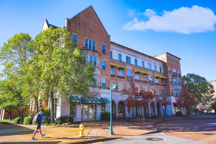 Student walking near South 40 residential area