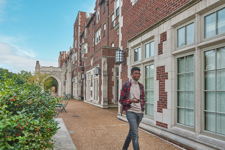 Student walking from Village House