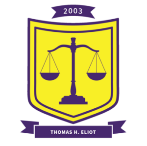 a yellow crest with purple balanced scales in the middle