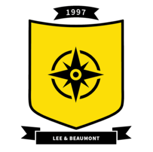 a yellow crest with a black compass in the middle